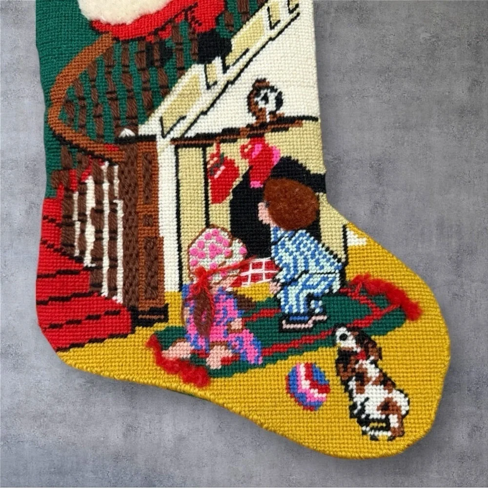 Vintage needlepoint Christmas stocking featuring design “Down The Bannister